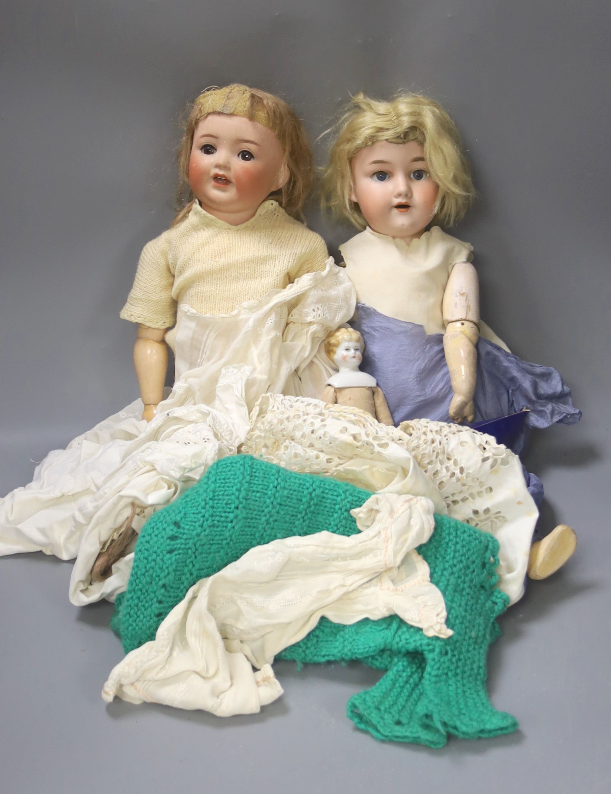 A Marseille doll and Heubach Koppelsdorf doll and small German shoulder china doll